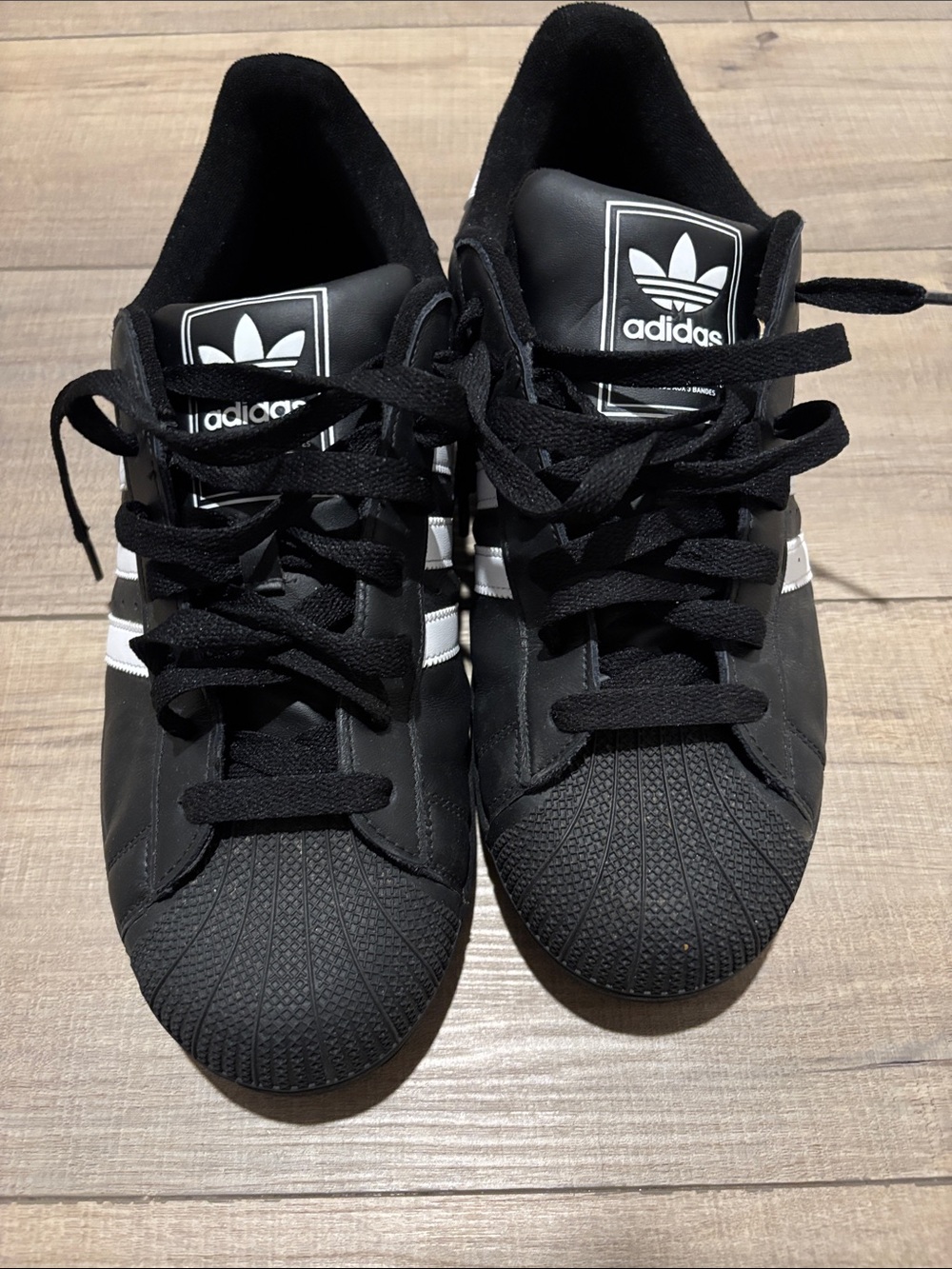adidas Men’s Black and White Classic Shelltoe Sneakers